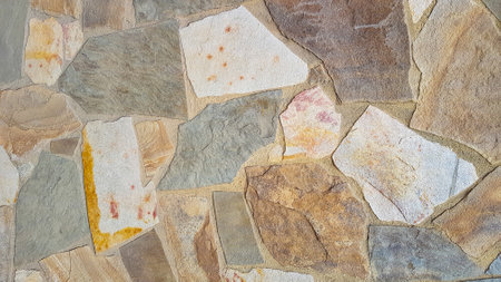 Background of stone wall texture for design with copy space for text or image.