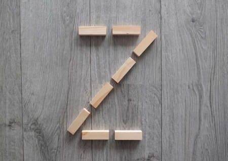 letter Z with wooden natural blocks, construction, game for kids, no stress with wooden blocks, backgroundの写真素材