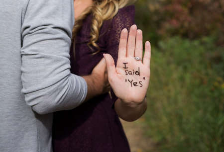 woman show hand with text i said yes wedding angagement love brideの写真素材