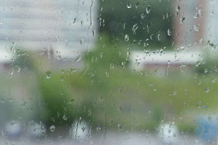 rain drops on window outside view water raindropの写真素材