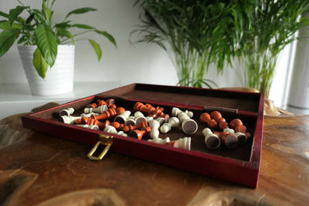 chess box on wood table game competition