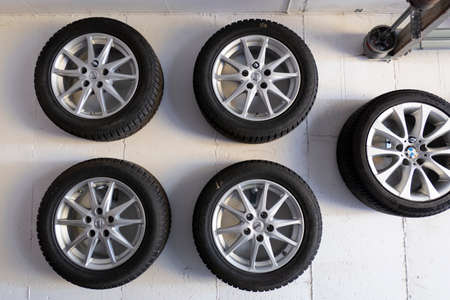 Car wheels on white wall transport tireの写真素材