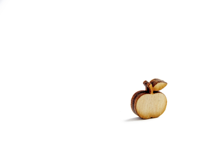 small wooden apple on isolated backgroundの写真素材