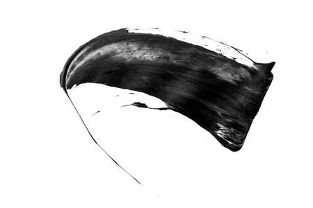 black paint brush  spot stroke on isolated white backgroundの写真素材
