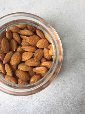 almonds in a jarの写真素材