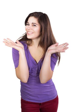 Brunette woman spread her hands happily isolated on whiteの写真素材