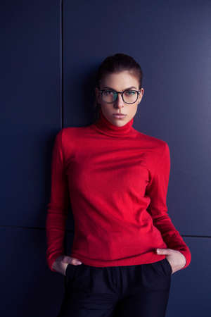 Beautiful caucasian woman in casual outfit outdoors walking, spending time in city. Sunny warm day. Stylish girlの写真素材
