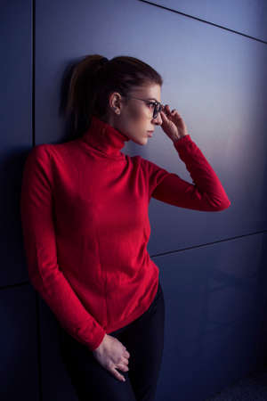 Beautiful caucasian woman in casual outfit outdoors walking, spending time in city. Sunny warm day....