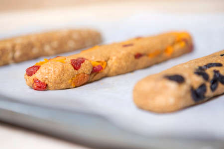Homemade tasty biscotti with raisins and dried fruits. Italian traditional receipt. Healthy no sugar...
