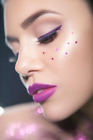 Close up beauty portrait of a fantasy art theme: Star Wars cosplay. Princess Leia hairstyle with...
