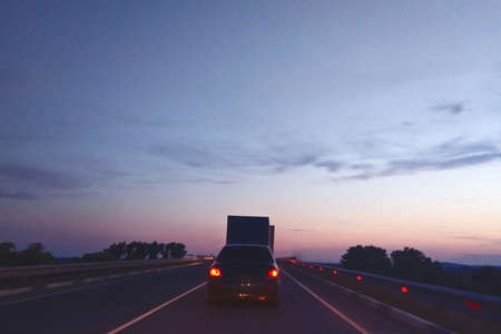 cars drive on the night routeの写真素材