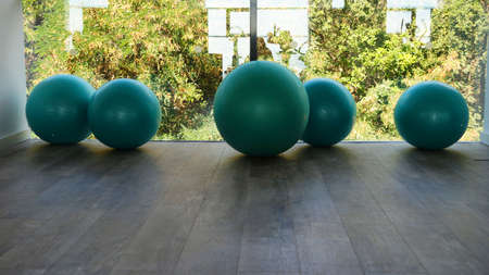 fitness balls by the window in the gym close upの写真素材