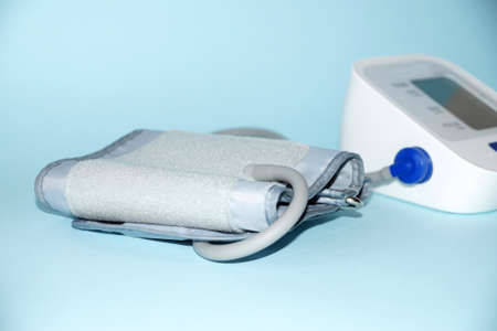 defocused photo, tonometer on blue background close-upの写真素材