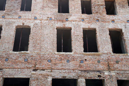 restoration of the facade of an old brick house close-up