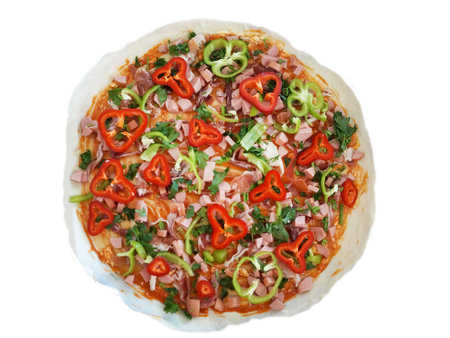 fresh pizza with vegetables prepared for baking, isolate on a white background.の写真素材