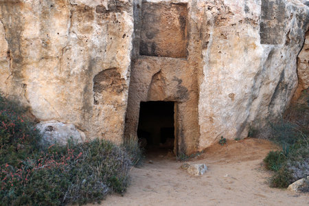 Entrance to an ancient rock-cut necropolis in Paphos, Cyprus.の写真素材