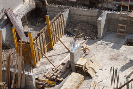 Monolithic construction. Installation of load-bearing wall formwork for concrete pouring. Top view.の写真素材