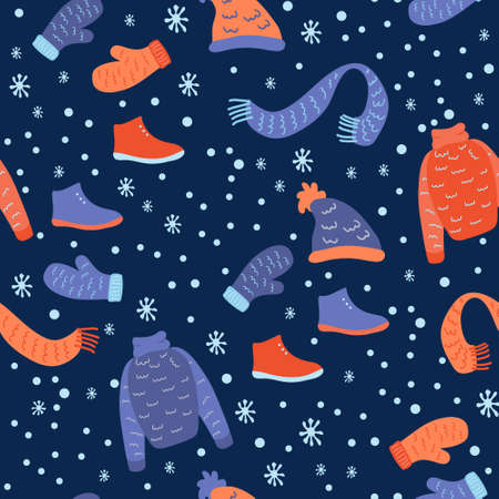 seamless pattern with winter clothes on a dark blue. Knitted hats, mittens, scarves, sweaters, boots. Christmas and winter theme.のイラスト素材