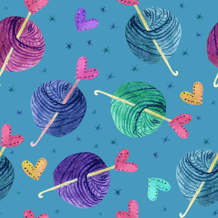 Watercolor seamless pattern with colorful balls of wool, crochet hooks for knitting, hearts and snowflakes on blue. Great print for fabric, wrapping papers, wallpapers, covers. Cozy winter themeの写真素材