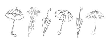 Vector set with open and closed umbrellas isolated on white background. Doodle style illustration in black ink.のイラスト素材