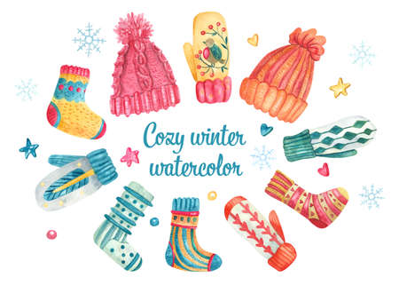 Watercolor set with cozy winter knitted clothes. Colorful cute hats, mittens, socks decorated with patterns. Hand painted illustration isolated on white. Great for winter cards, posters design.の写真素材