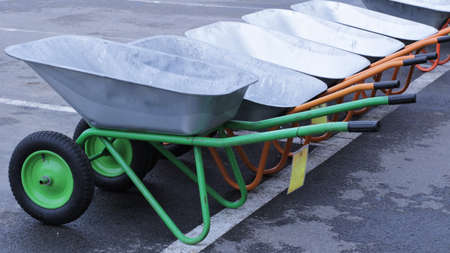 several new two-wheeled carts on sale at the beginning of the garden spring season, garden and...
