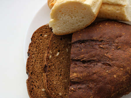 texture of sliced rye and wheat bread close-up, gluten-containing flour in the production of...