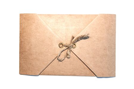 kraft paper envelope tied with hemp isolated on white background