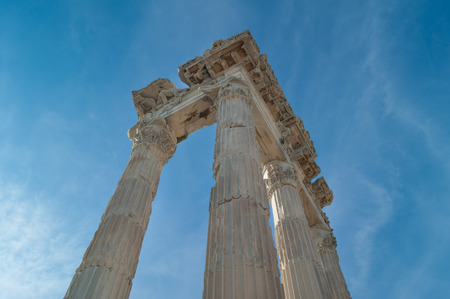 Corinthian columns and fluted capitals with acanthus leaves of the Ancient Greek Temple of Trajan in...