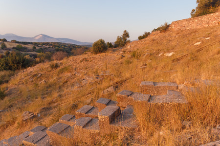ruins of ancient amphitheatre in Erytrai, Ildiri, Cesme, Turkey sunset time viewのeditorial素材