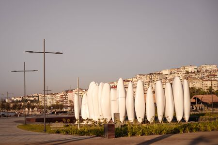 IZMIR, TURKEY, JULY 29, 2019: View of the Konak area and white sculptures in fountain. Shot at sunsetのeditorial素材