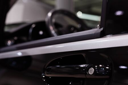 Car pasted with vinyl film. Close-up shallow depth of field.