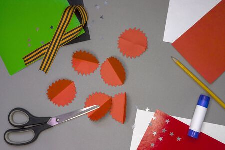 Instructions for step by step creating a do-it-yourself greeting card for May 9 flat lay. May 9 is...