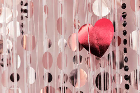 Garland of hearts. blurred background with heart shaped bokehの写真素材