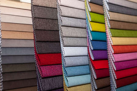 Multicolor upholstery fabric samples close-up shallow depth of field. color selection