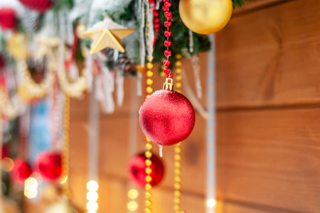 Close up balloons outside, winter. Bokeh garlands in the background. New year concept. Winter outdoor decorations. The atmosphere of magic.の写真素材