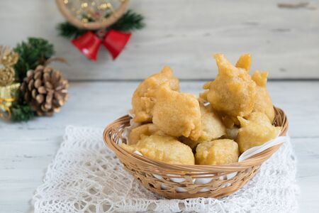 Pettole is a traditional christmas south italian food cooked from dough and fried in olive oil, made in Salento, Apuliaの写真素材
