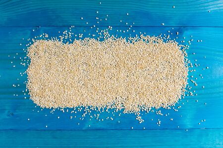 Grains of quinua on wood - Chenopodium quinoa