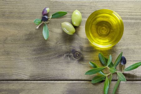 one bowl of extra virgin olive oil produced in Apulia, Italy, copy space, top viewの写真素材