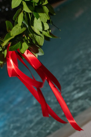 Celebrating Traditions With a Laurel Wreath and Red Ribbonsの写真素材