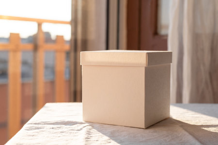 Mockup of clean white cardboard packaging for juice for design presentation.