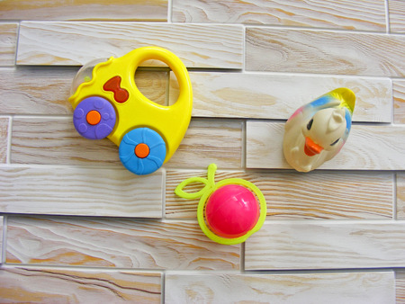 Children's World toys on a wooden backgroundの写真素材