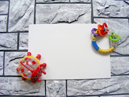Children's World toy on a wooden background with place for writing in stone backgroundの写真素材