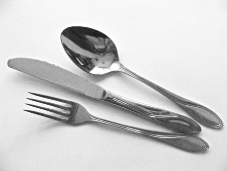 black and white / fork, spoon and knife isolated on white