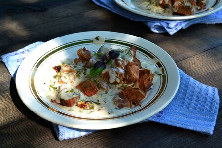 Meat stewed with vegetables in white sauce  russian goulash.の写真素材