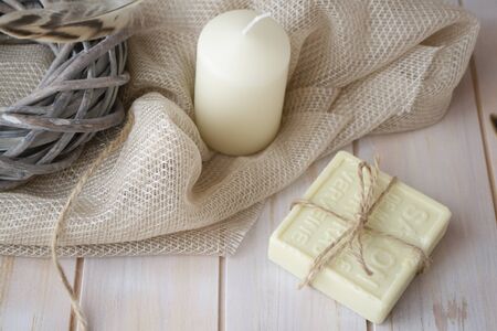 Organic handmade soap on white planks table, vintage styleの写真素材