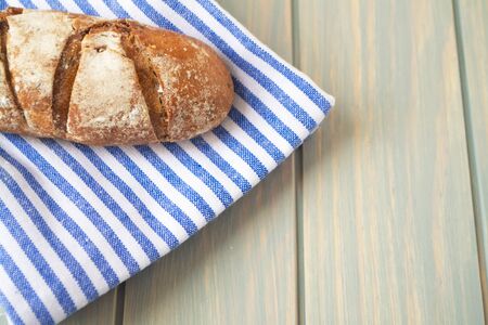 Homemade whole wheat bread, small country bread, copyspaceの写真素材