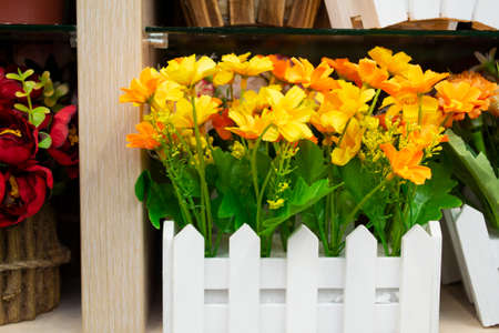 artificial yellow flowers in bouquet made from cloth, objest of interiorsの写真素材