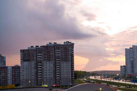 Arcus cloud or shelf cloud of a massive storm rolling over townの写真素材