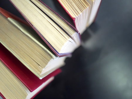 Top view of colorful hardback old books with copy space. Education background.の写真素材